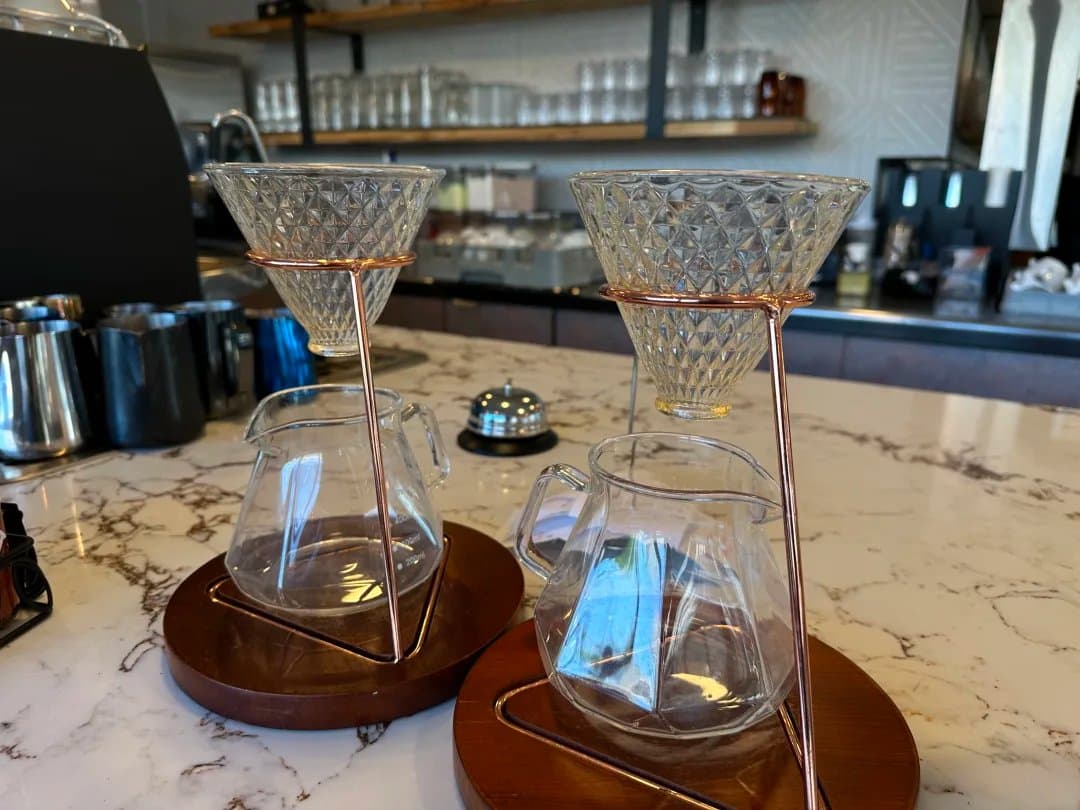 Pour-over coffee setup on the marble counter