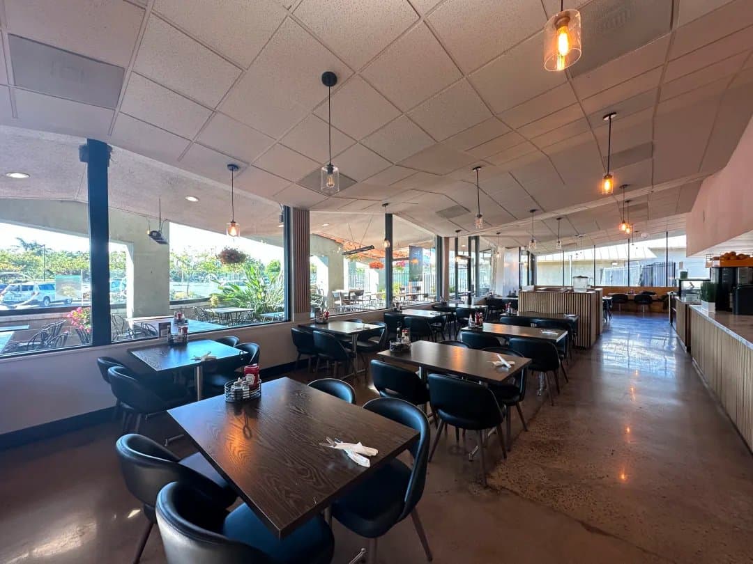 Sunlit dining room with big windows at iJava Cafe Willow Glen